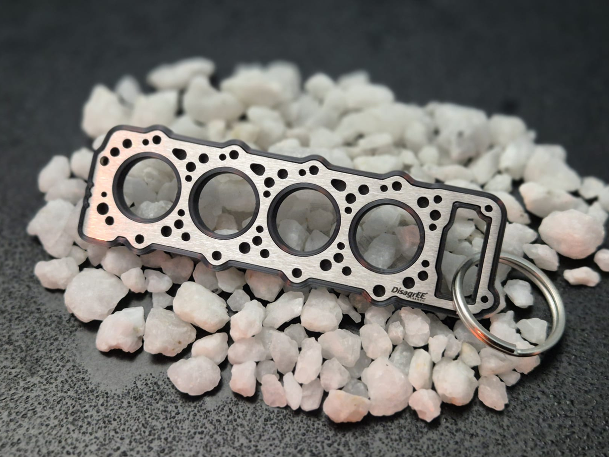 keychain - Schlüsselanhänger - Miniatur einer Kopfdichtung für Mitsubishi 4M40 - DisagrEE Germany