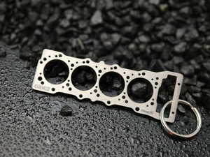 keychain - Schlüsselanhänger - Miniatur einer Kopfdichtung für Mitsubishi 4M41 / 4M42 - DisagrEE Germany