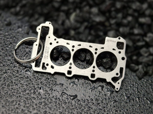 keychain - Schlüsselanhänger - Miniatur einer Kopfdichtung für Audi/Porsche 2.9 TFSI BiTurbo EA839 - DisagrEE Germany