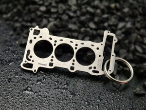 keychain - Schlüsselanhänger - Miniatur einer Kopfdichtung für Audi/Porsche 2.9 TFSI BiTurbo EA839 - DisagrEE Germany