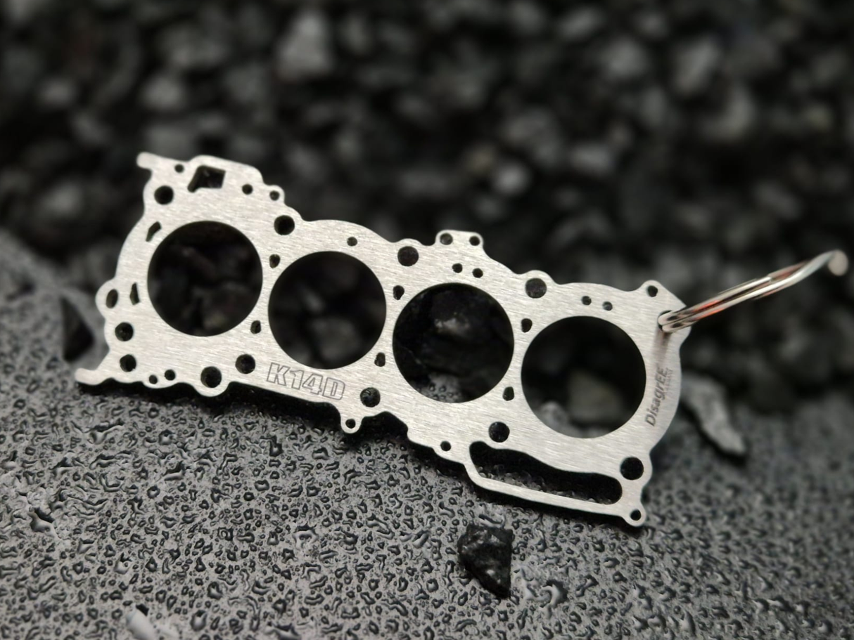 Miniatur einer Kopfdichtung für Suzuki K14C DisagrEE