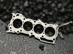 Miniatur einer Kopfdichtung für Suzuki K14C DisagrEE