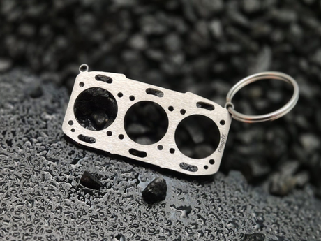 Miniatur einer Kopfdichtung für Porsche M96.7x/M97.7x - "Mezger Motor" DisagrEE