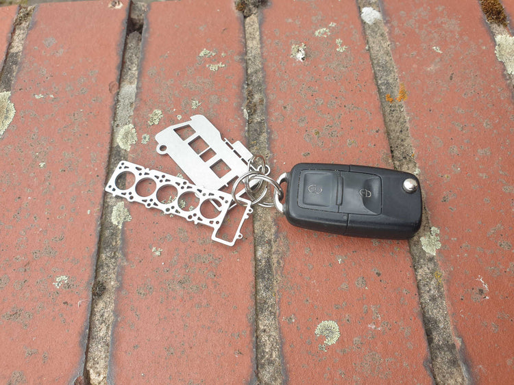 Miniatur einer Kopfdichtung für VW 2,5 TDI (EA188) - DisagrEE - keychain - Schlüsselanhänger